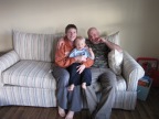 Me, my son, and husband on our new couch (which I love)